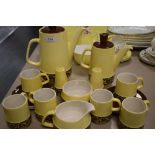 A Carleton ware part coffee services,in brown and yellow colour also having salt and pepper pots,