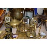 A good assortment of vintage brass including religious wall plaque, coal scuttle, candle sticks,