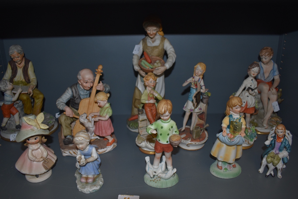 A selection of figures and figurines including four Capodimonte