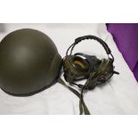 A collection of Militaria including Gas Mask, Head Phones and Combat Vehicle Crewman Helmet etc