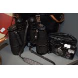 A set of Tecnar by Swift binoculars 16x50 and Canon camera