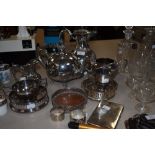 A selection of plated items including napkin rings, tea pots, sugar bowl, cigarette case and more.
