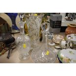 Two vintage decanters and a large cut glass vase having etched design.