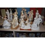 A quantity of moulded figurines,and two lamps, the majority being ' The Leonardo collection '.