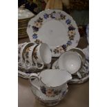 A mid century Royal Sutherland part tea service having silver gilt accents and floral transfer patt