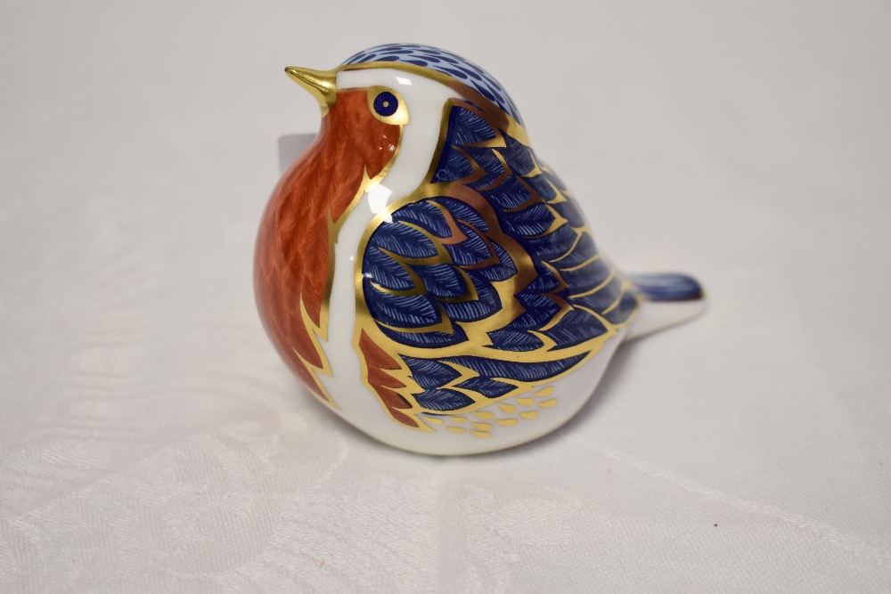 A Royal Crown Derby Paperweight. Robin modelled by Robert Jefferson and decoration design by Jo