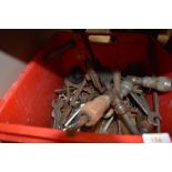 A box of vintage hand brace drills, files, mole grips, Whitworth and AF spanners,and similar.
