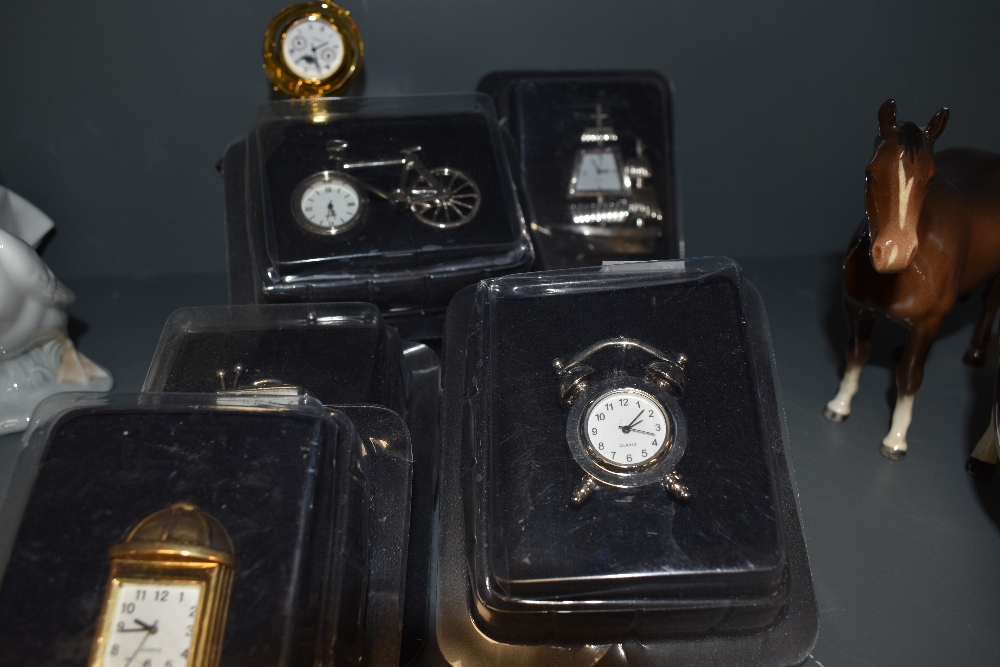 A selection of pocket or small size watches and clocks