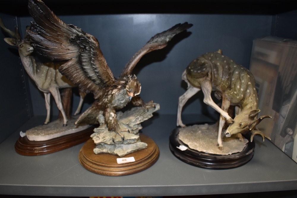 A selection of animal figures and figurines by Capodimonte including eagle and deer pair