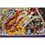 A small selection of costume jewellery beads and simulated pearls