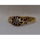 A lady's18ct gold signet ring having an old cut diamond, approx 0.20ct in a pierced and moulded