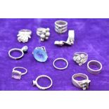 A selection of white metal dress rings, all stamped 925/silver of various forms