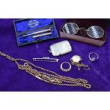 A small selection of costume jewllery including a pinch beck muff chain, two silver dress rings,