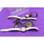 A small selection of wrist watches including Camy, Sekonda etc and a costume ring