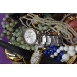 A selection of costume jewellery including beads and fashion watches etc
