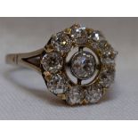 A lady's dress ring having a diamond daisy cluster, total approx 2.75ct, in an open pave set mount