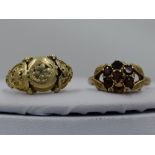 A lady's dress ring having a garnet cluster (AF) to open shoulders on a 9ct gold loop, size O & a