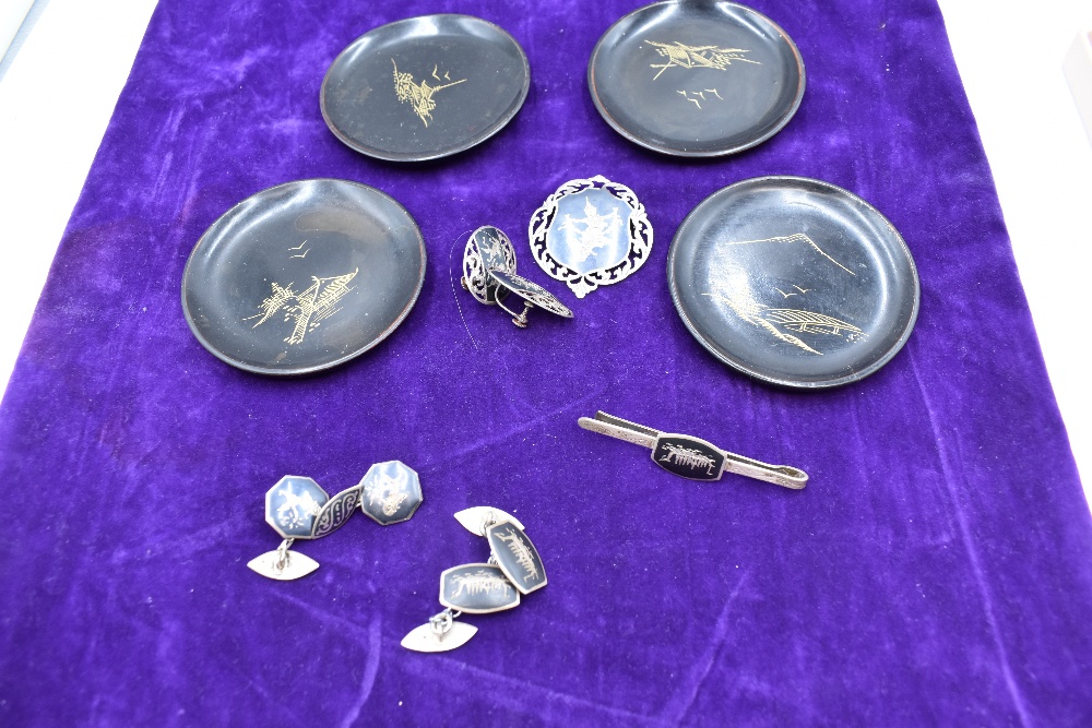 A small selection of white metal jewellery stamped Siam sterling bearing images of Oriental