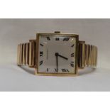 A gents 9ct gold wrist watch by Jean Renet having a Roman numeral dial to square face on a later