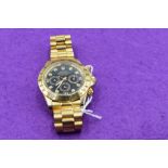 A gents gold plated wrist watch bearing name Rolex and etched WINNER AD DAYTONNA 1992 to back of