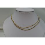 A 9ct gold figaro chain, approx 26'