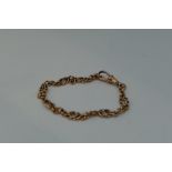 A 9ct rose gold fancy link bracelet
