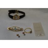 A selection of 9ct gold and yellow metal jewellery including a dress ring loop, marks worn but