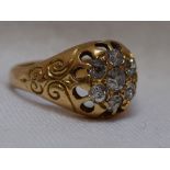 A Victorian 18ct gold signet ring having a diamond cushion cluster, approx 0.4ct to moulded