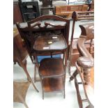 An early 20th Century mahogany cake stand of three tier adjustable design, height approx. 87cm