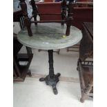 A 20th Century circular marble top conservatory table/lazy susan on cast iron column and trefoil