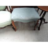 A 19th century refurbishment stool having pale blue upholstery and mahogany legs
