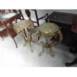 A pair of late 20th Century brass jardiniere stands in the Oriental style having shaped legs, height