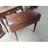 A 19th century mahogany occasional table having drop leaf top, on tapered legs, closed width approx.
