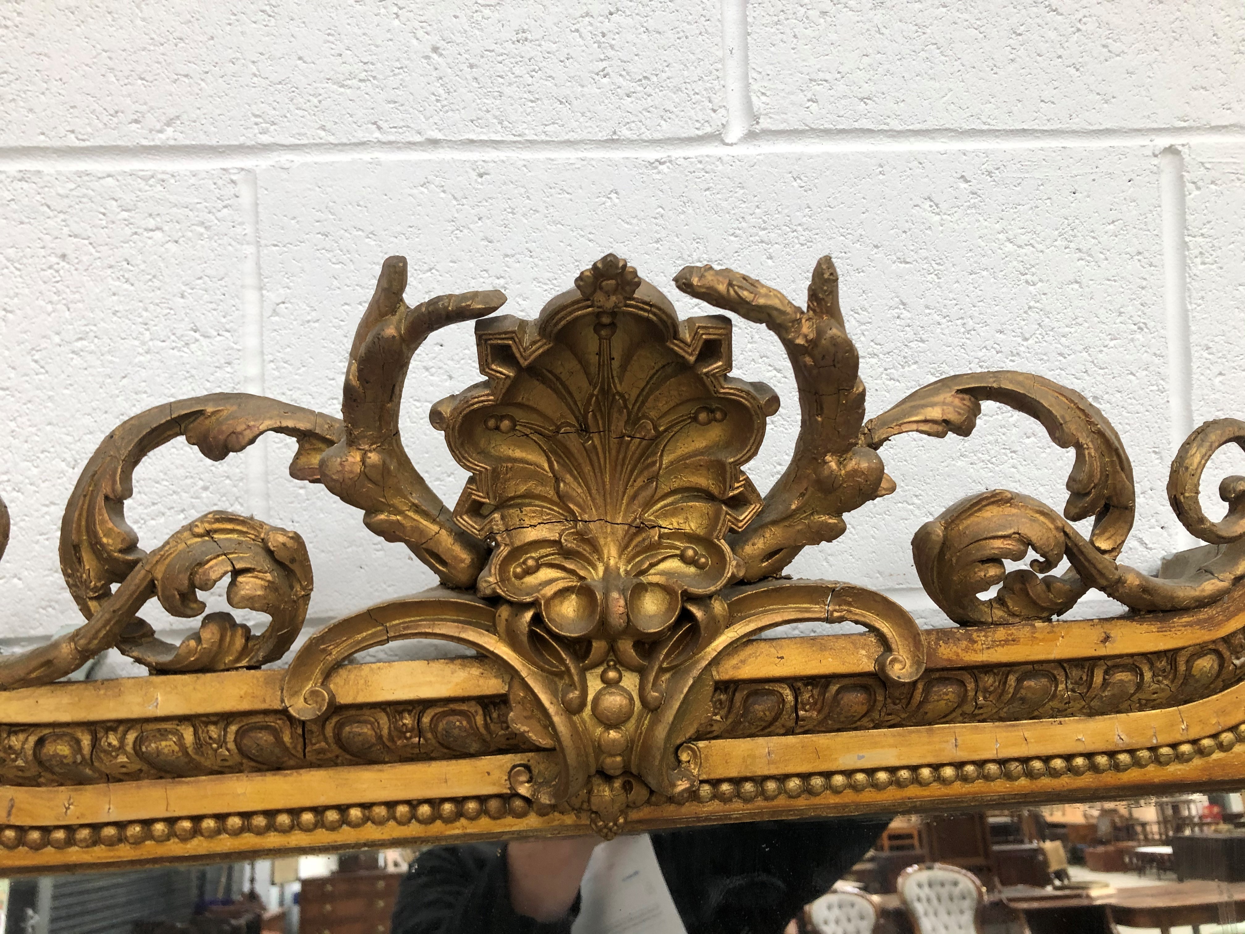 A 19th century gilt plaster overmantel mirror having pillar and scroll crest frame, approx - Image 4 of 4