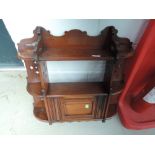 A late Victorian mahogany wall cabinet having open shelves and cupboard, width approx. 60cm
