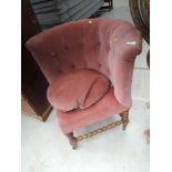 A late 19th mahogany corner chair having later pink upholstery on bobbin frame