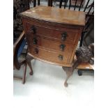 A mid 20th Century burr walnut period style bedside chest of three drawers on cabriole legs, width