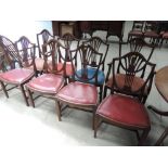 A set of eight (6 + 2) 20th Century mahogany dining chairs in the Hepplewhite style having shield