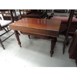 A 20th Century mahogany period style commode stool having inset panel and reeded legs, width approx.