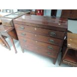 A 19th century mahogany chest of four long cockbeaded, graduated drawers on shaped feet, width