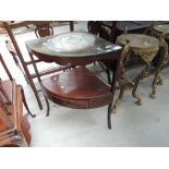 An early 19th Century mahogany corner washstand having line inlay decoration and drawer base,