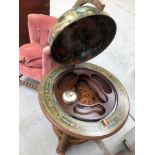 A reproduction drinks cabinet designed as a period globe on twist frame, width approx. 80cm