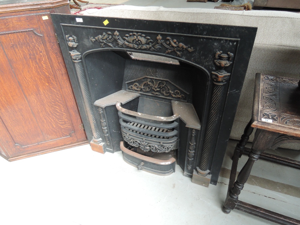 A 20th Century Stovax cast iron fire surround in the Regency style, approx 97cm x 97cm