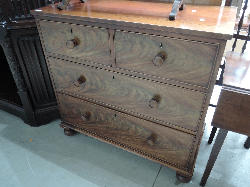 A 19th century part flame mahogany chest of two short and two long cockbeaded drawers, on later