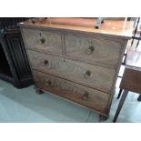 A 19th century part flame mahogany chest of two short and two long cockbeaded drawers, on later