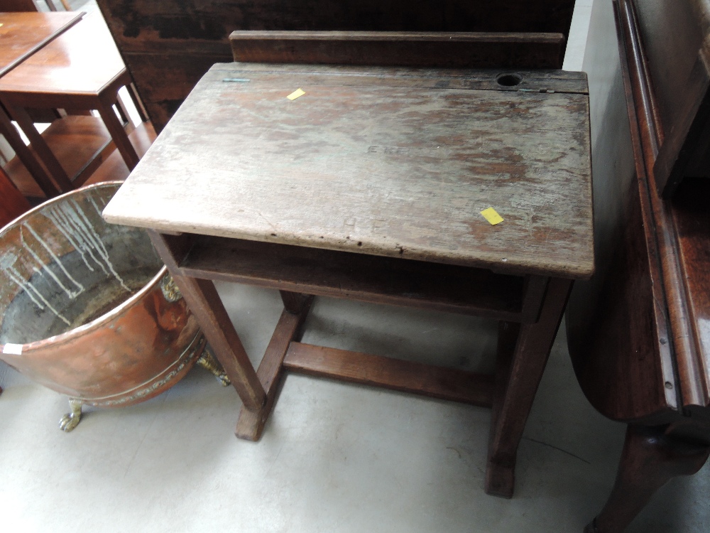 An early 20th Century oak school desk of traditional style, width approx. 64cm