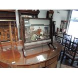 A late 19th century mahogany toilet swing mirror having reeded detail, width approx. 58cm