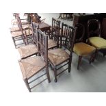 A set of four early 19th century chairs having Lancashire spindle backs, with later rush seats and