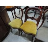 A Victorian mahogany arch and slat salon chair having later gold dralon upholstery on cabriole