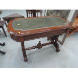 A 20th Century part burr walnut Victorian side table/desk having skiver top with frieze drawer on